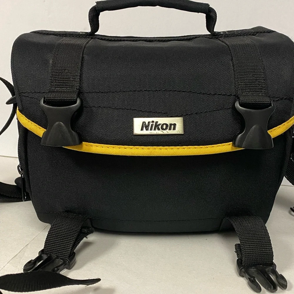 Nikon D5300 Camera Body w strap and 3 lenses 4 batt carry bag